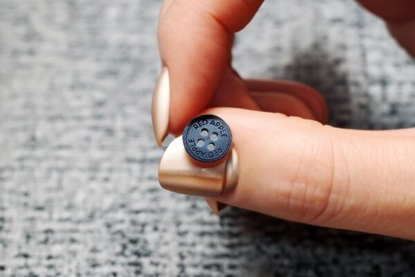 The Elevation of Fashion: Exploring Laser Engraved Branding in Buttons